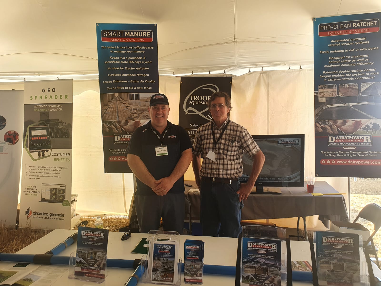 North American Manure Expo with Troop Equipment with two representatives behind the display